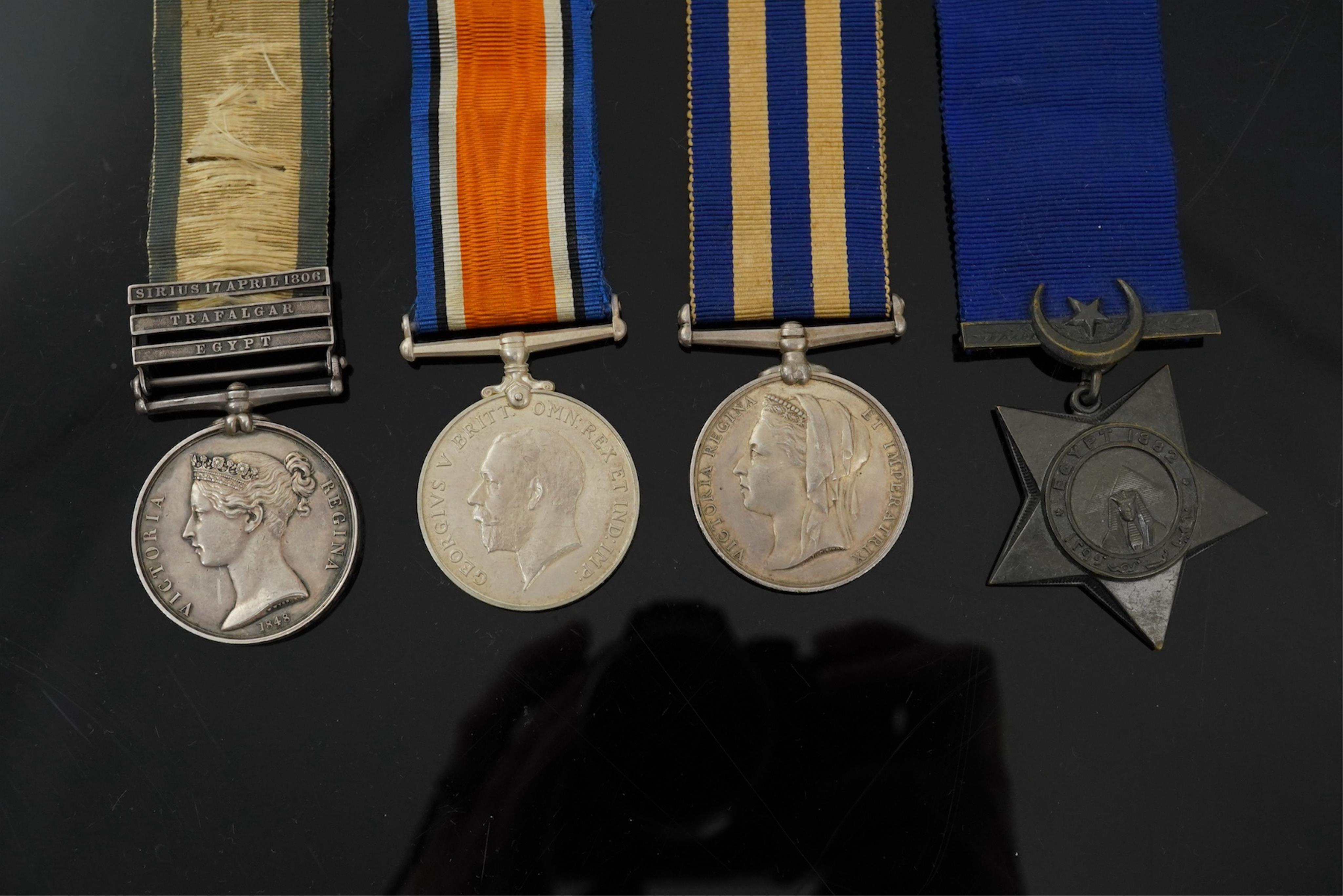 Battle of Trafalgar interest; Four medals awarded to members of the Robertson family. A Victorian naval General Service Medal to Thomas Robertson, Surgeon, with three bars for;, Sirius 17 April 1806, Trafalgar and Egypt,